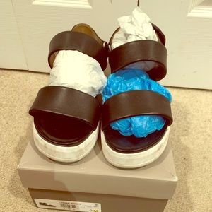 Franco Sarto flat platform sandals.